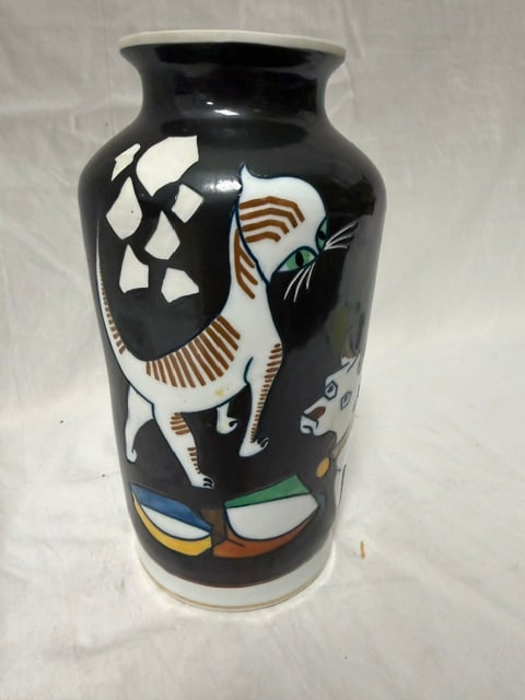 Porcelain Vase: Porcelain vase with hand-painted folk art design featuring stylized animals by Weisss Kuhnert