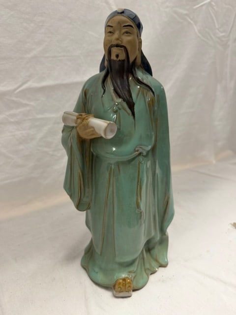 Chinese Sculpture Figurine: Ceramic figurine depciting a Chinese scholar or sage holding a scroll