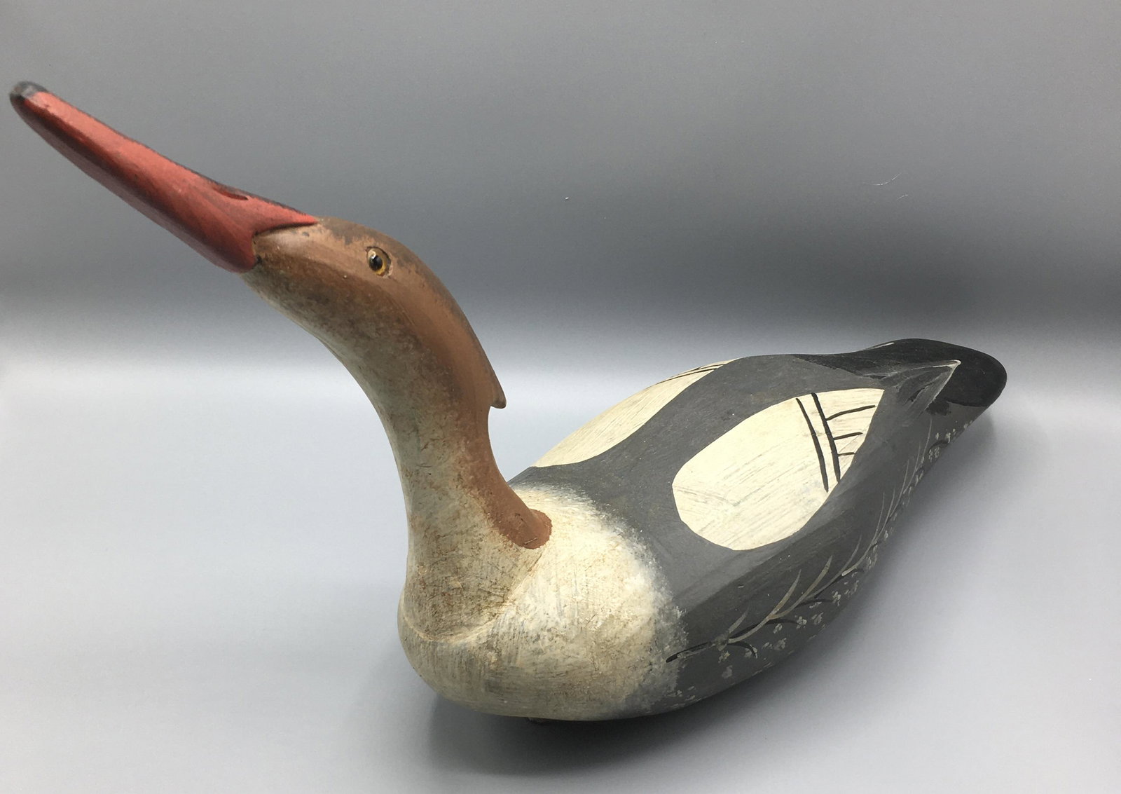 Red-Breasted Merganser Drake by Capt. Bryant: An 18 inch swallowing Merganser decoy by Capt.Vernon Bryant,, Perryville, MD. Signed with his brand on the bottom. Original paint with minor wear