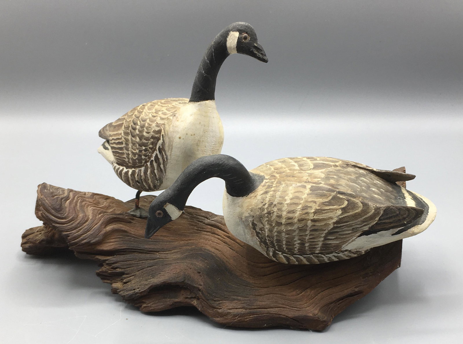 Miniature Canada Geese by R. Gustave Jansson: A pair of 6 1/2 miniature Canada Geese by R. Gustave Jansson (1889-1970), Cummaquid, MA Cape Cod. Gustave is one of Cape Cod's early bird carvers, born a couple years before Cleon Crowell. Signed with