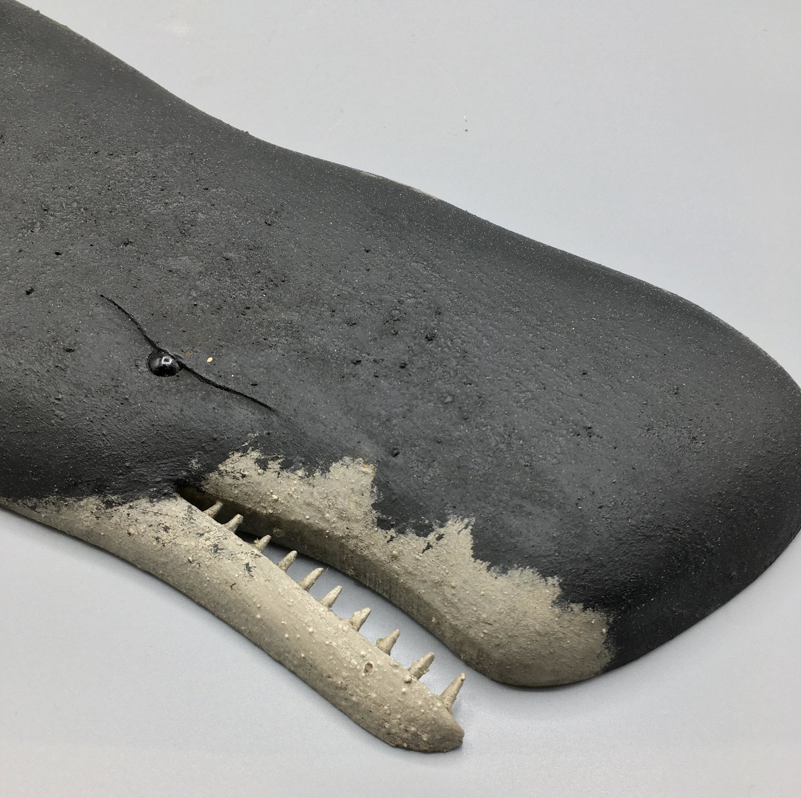 Sperm Whale Plaque by Brian Mitchell: A 24 inch Whale plaque by Brian Mitchell from Boone, NC, signed on the back. The carving and paint reflect life-like motion and superb posture of the Whale. In original paint with minimal wear.
