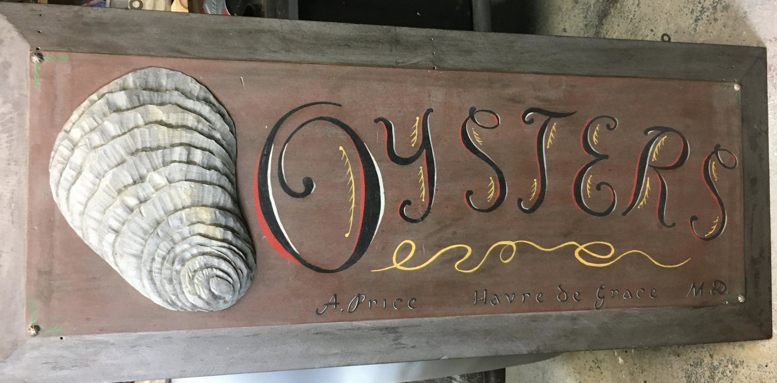 Hand Carved Oyster Sign: A 17 by 42 inch hand carved and hand painted oysters sign by Roger Mitchell. Sign reads "Oysters, A. Price, Havre de Grace, MD"
