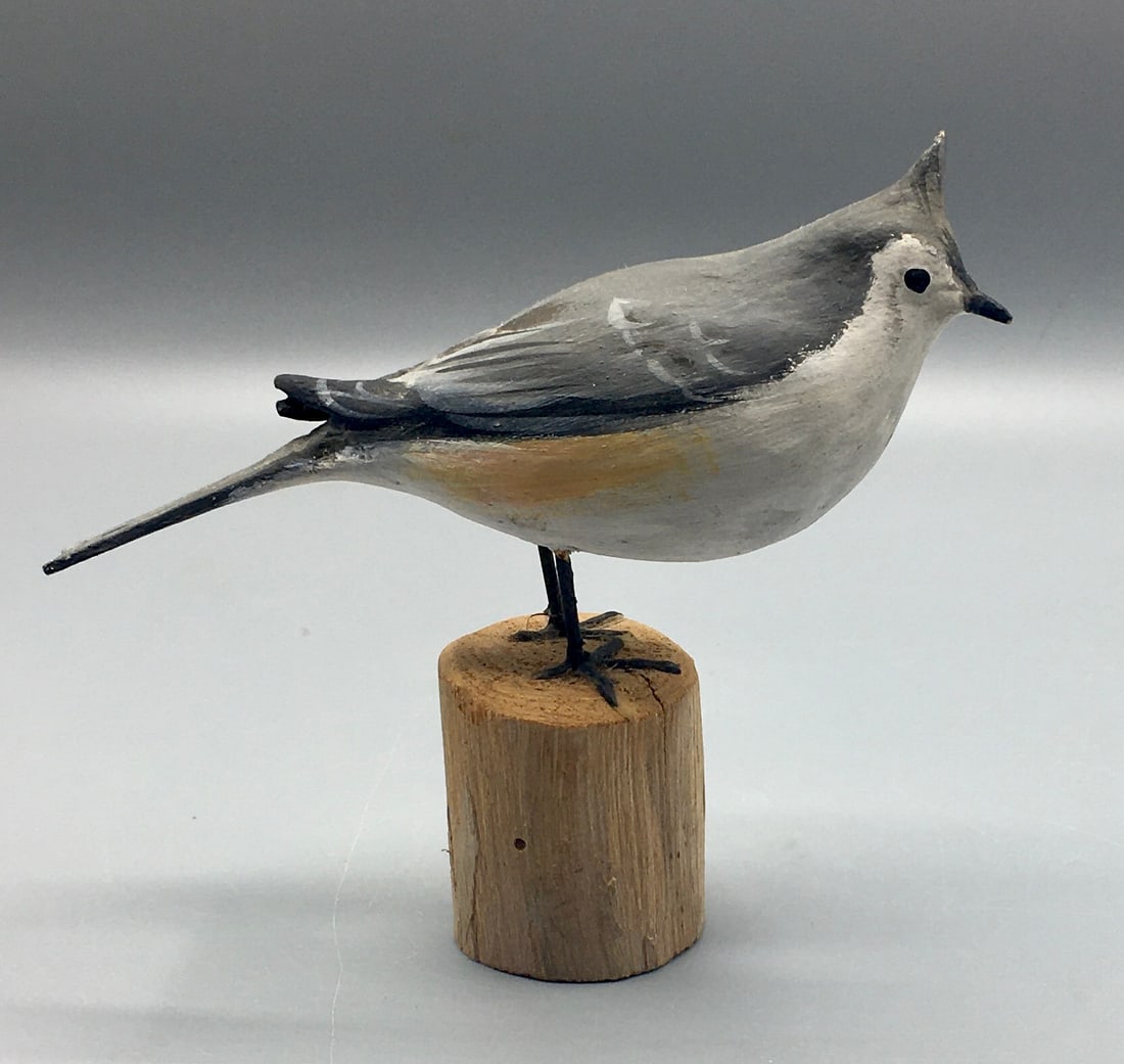 Tufted Titmouse by Peltz: A 5 1/4 inch bird carving by Peter Peltz (1915-2001), Sandwich, Cape Cod, MA, signed on the bottom of the base. Original paint with minor wear.