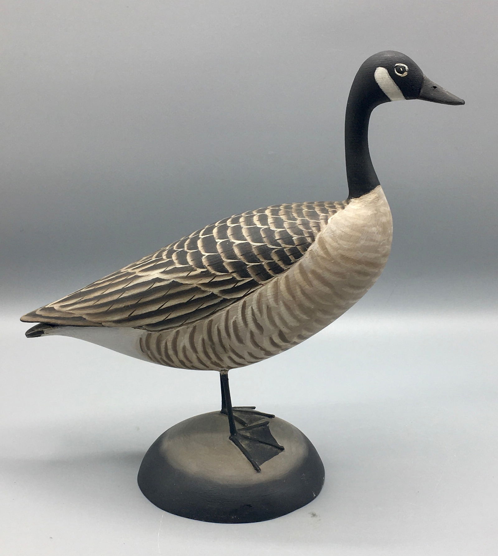 Miniature Canada Goose by Lapham: A 9 inch miniature Canada Goose by James Lapham (1908-1987), Dennisport, Cape Cod, MA. Signed by the maker on the bottom of the base. Original paint with minimal wear.
