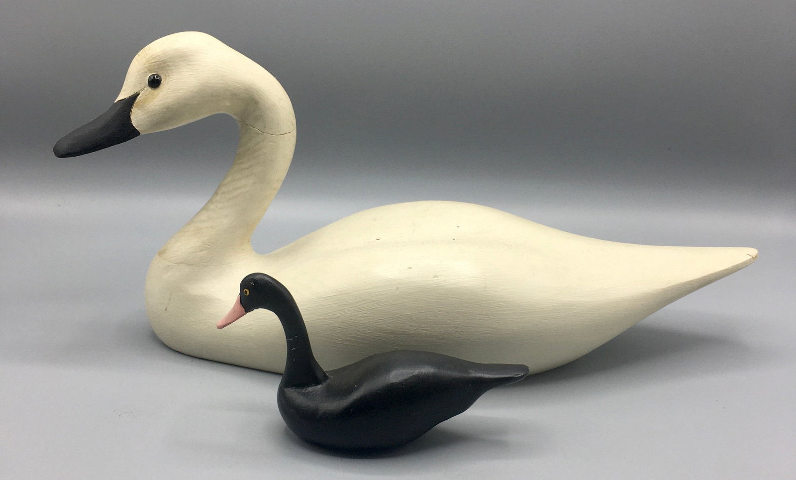 Miniature Swan and a Quarter Size Swan: A 5 1/2 inch Australian Black Swan by Clarence "Titbird" Bauer (1924-2006), Havre de Grace, MD. Bauer worked for Madison Mitchell for 32 years and worked with numerous other area carvers in his later 