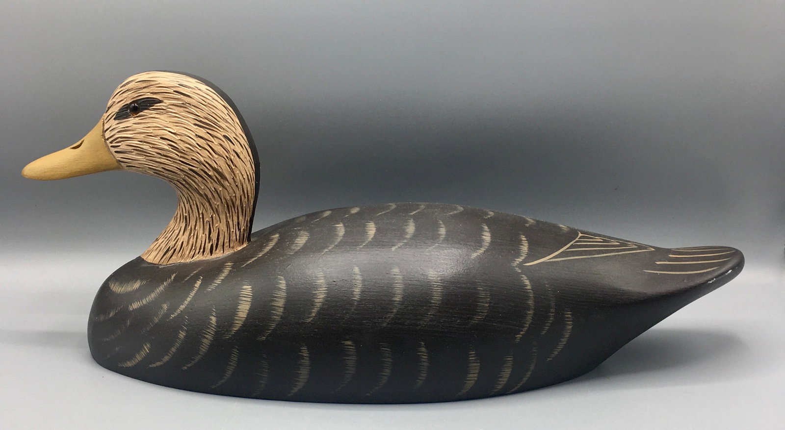 Black Duck by Wildfowler Decoys: A 15 1/2 inch Black Duck decoy by Wildfowler Decoy Co., Bohemia, NY. Wildfowler decoys from Bohemia are among the rarest and this exact decoy is Illustrated in the 2004 book, "Wildfowler Decoys." in t
