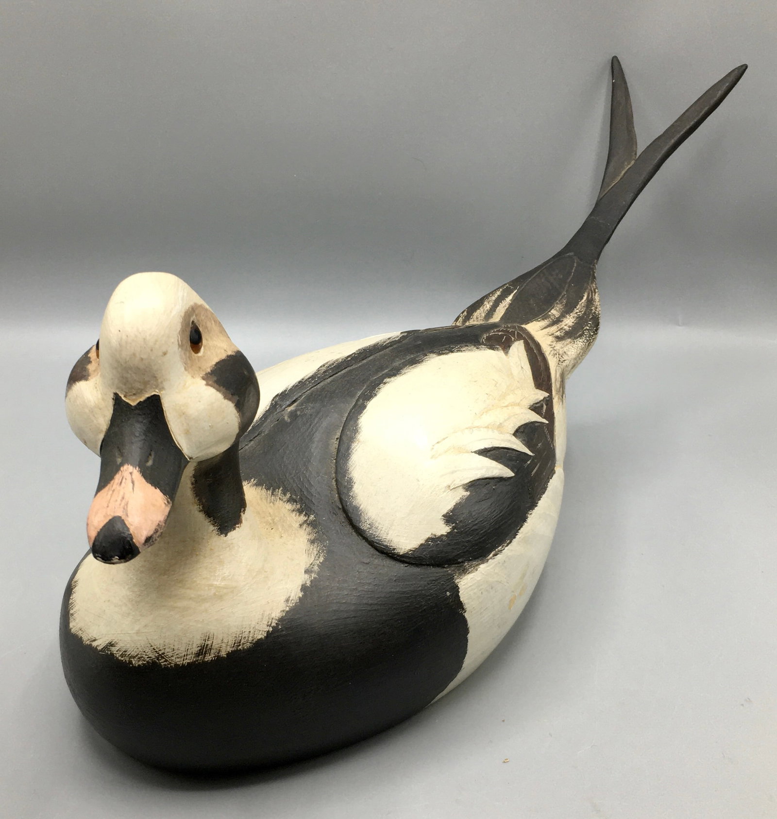 Old Squaw Decoy by Mike Wavercak: A 17 inch Old Squaw or Long Tail duck decoy by Michael Wavercek (1932-1984), Seneca River, NY,, signed on the bottom by the maker. Original paint with minor wear.