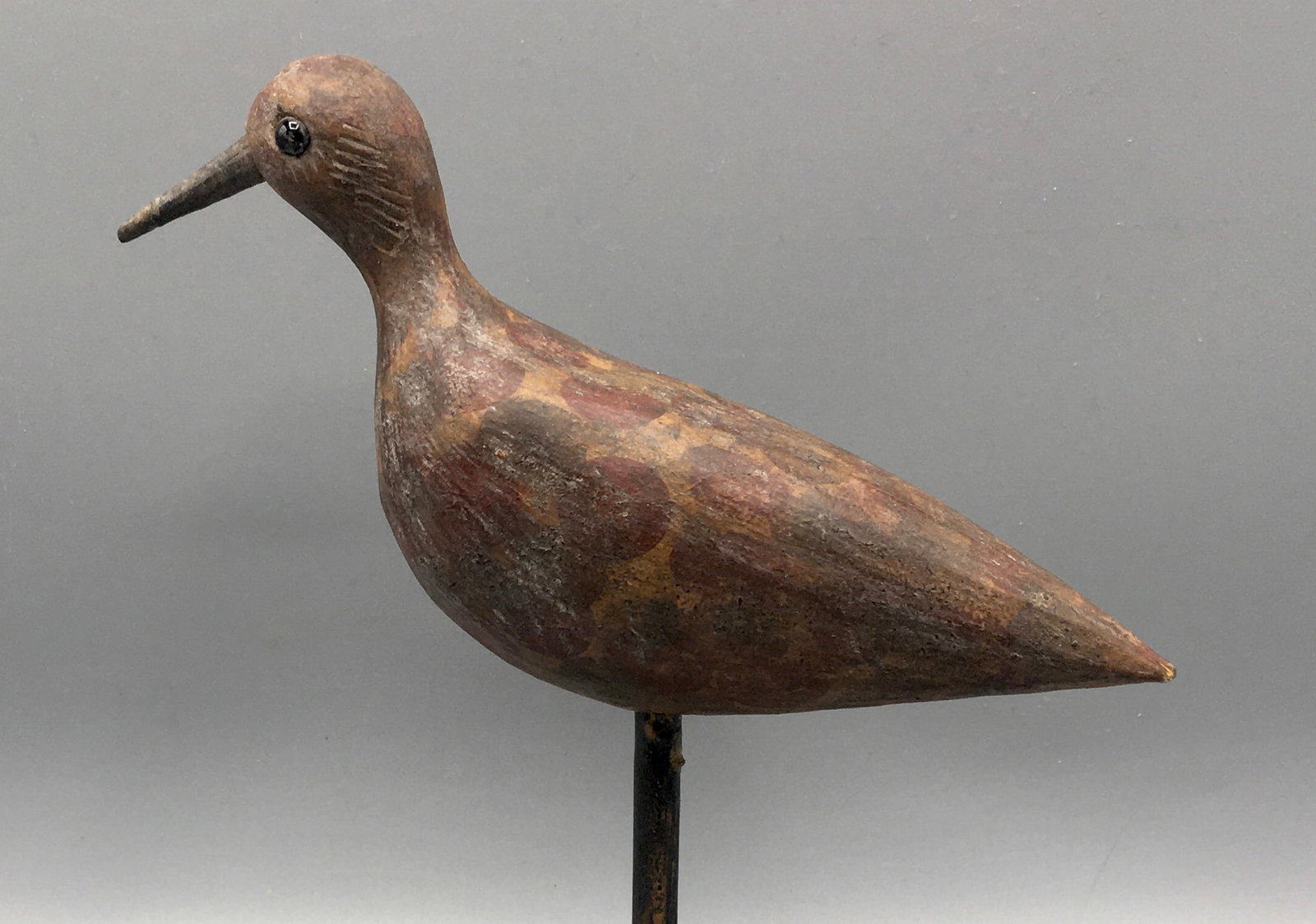 A "Peep" Sandpiper Decoy: A 6 1/4 inch "peep" sandpiper decoy with a Southern attribution. Displays glass bead eyes, great form , and mottled paint. Original paint, paint was dabbed on with a half-inch circular instrument, wit