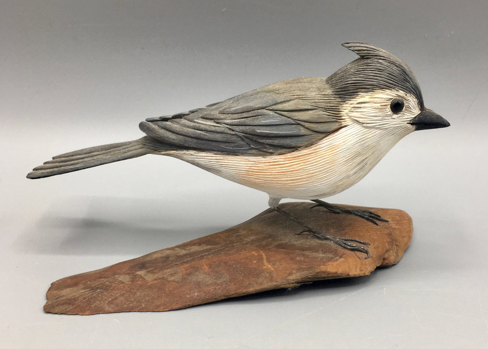 Tufted Titmouse by E. Frankhauser: A 5 1/4 inch bird carving by E. Frankhouser, signed and dated 1981 on the bottom of the base.. Original paint with minor wear.
