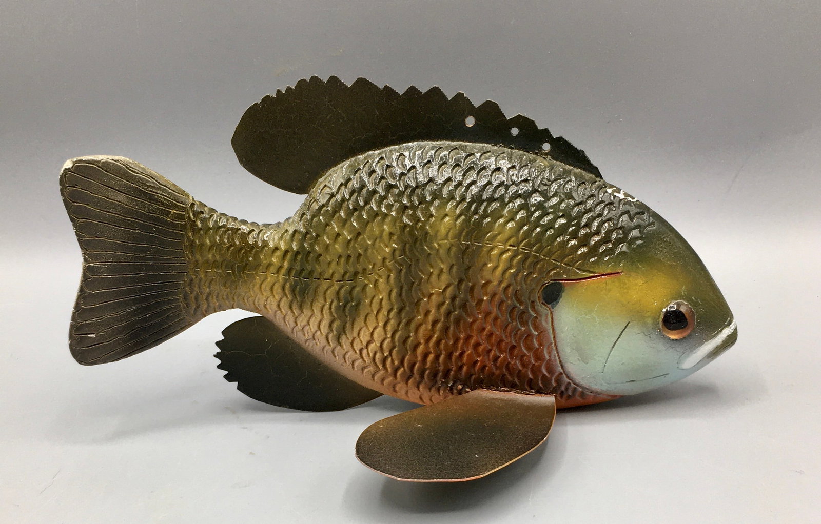 Bluegill Fish Decoy: A 7 inch Fish decoy with fish scale detail, unsigned. Original paint with minor wear.
