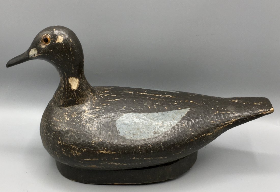 Blue-Winged Teal Drake: An 11 inch folk art Blue-Winged Teal drake decoy with glass eyes and a bottom board. Unsigned.