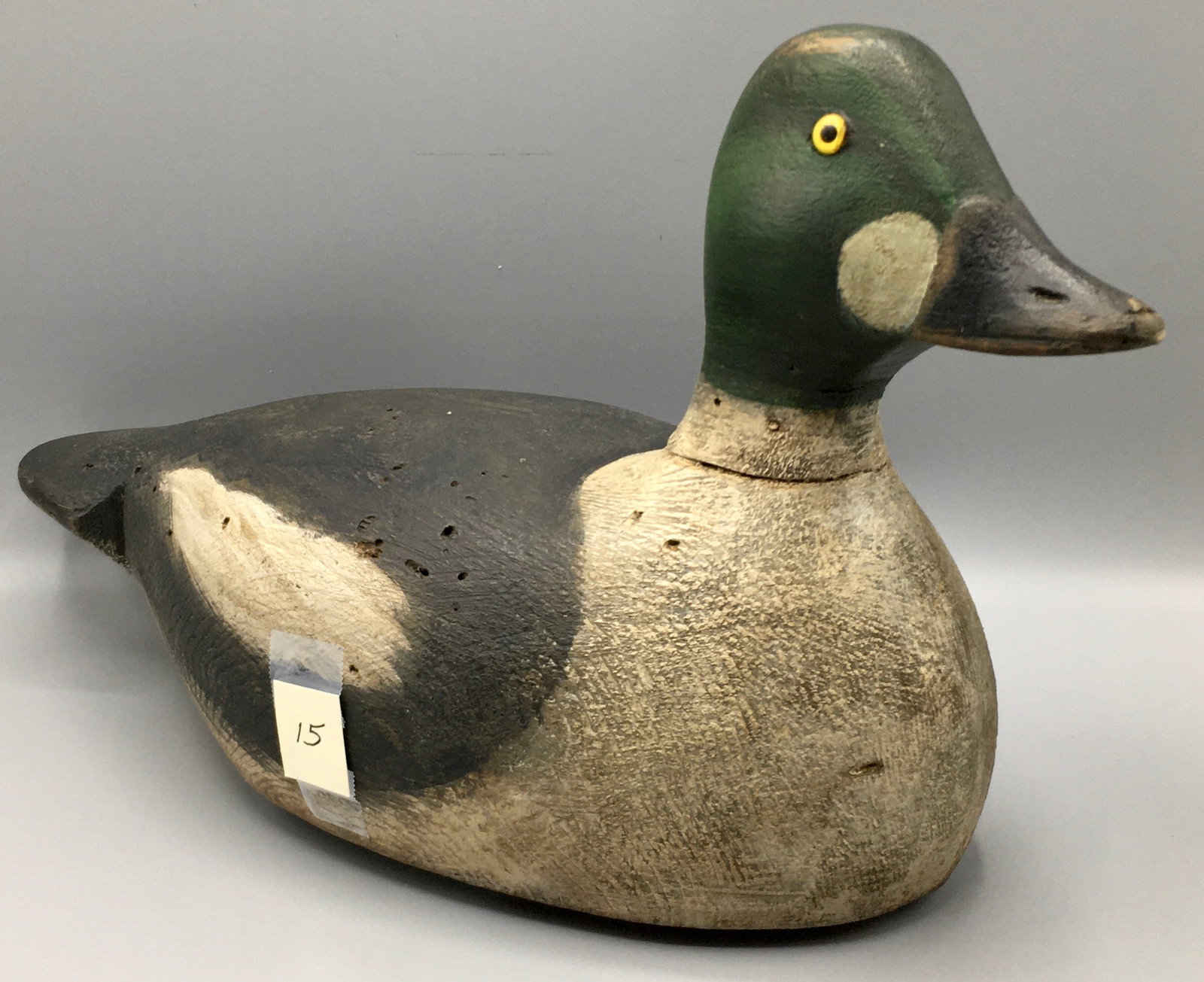 Alert Goldeneye Drake from New York: An alert inch Goldeneye drake duck decoy. In old in-use paint with light gunning wear.