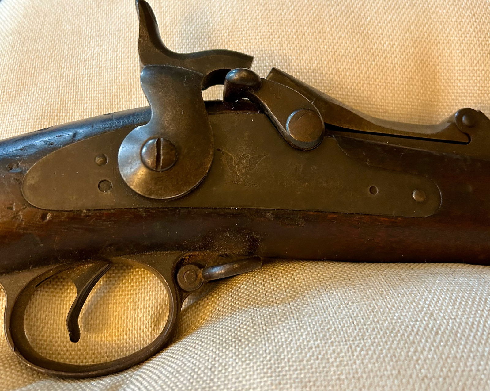 An Antique Springfield Model 1873 Rifle: A 49 inch 1873 Springfield Trapdoor rifle, stamped "U.S. Model 1873," in the barrel area, the lock is lightly stamped "Eagle, U.S. Springfield." Top of butt plate stamped "US" and there are several in