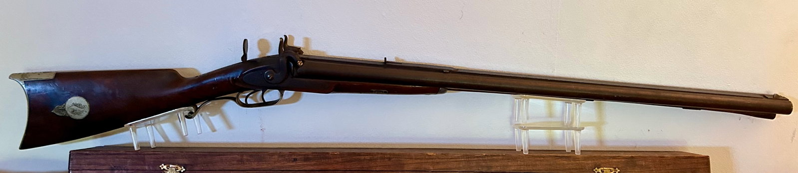 Antique Percussion Combination Rifle and Shotgun: A 42 3/4 inch side by side combination percussion 12 gauge shotgun in one barrel and a 38 caliber rifle in the other barrel. This combination long arm was made by B. Whitman of Stillwater, NY in the 1