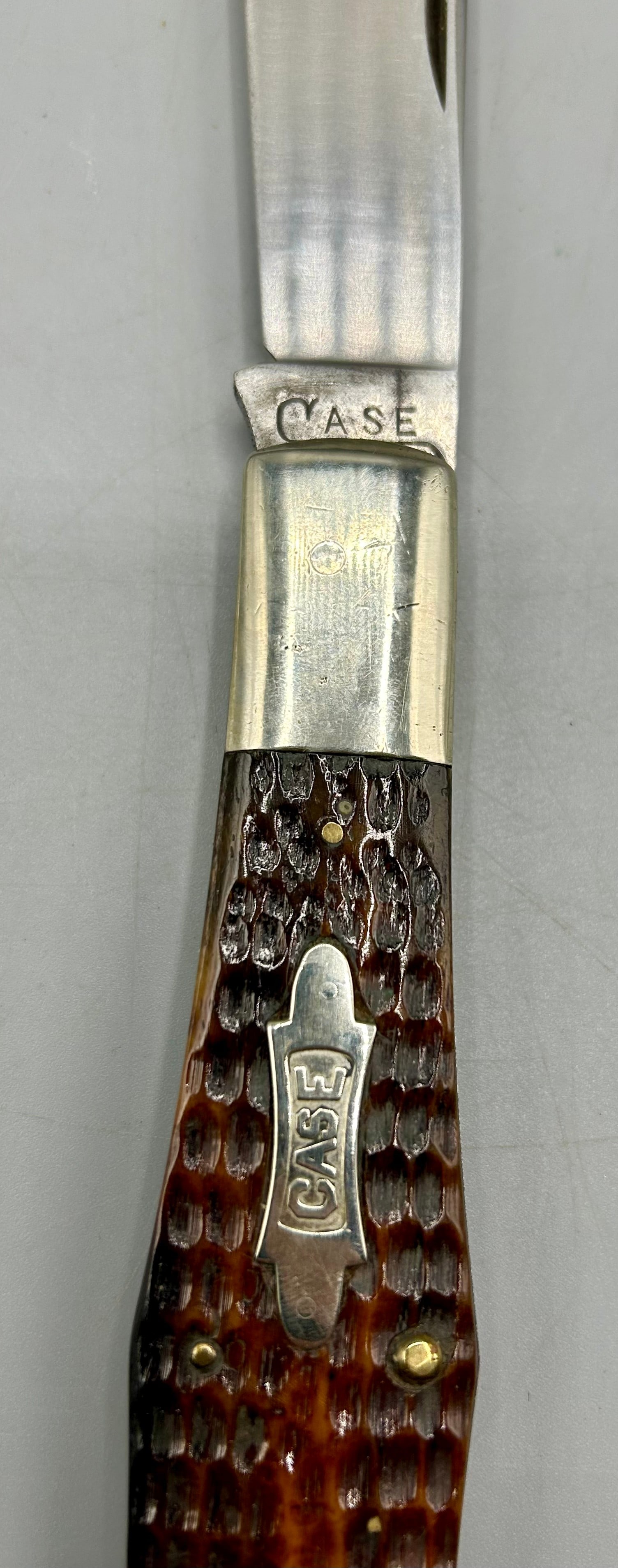 Rare 1934-1940 Case Folding Knife: A 9 1/2 inch "Coke Bottle" shape single blade Folding Knife, 5 3/8 inches closed, model no.61050 with brown bone handle scales. Dating from 1934-1940 according to the style of the "CASE tested xx" tan