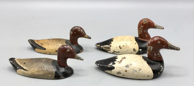 Four Miniature Cast Iron Decoy Paperweights
