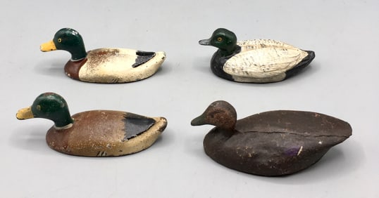 Four Miniature Cast Iron Decoy Paperweights