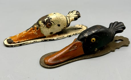 Two Antique Cast Iron Duck Head Clips