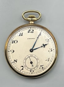 A 14 Kt Gold Pocket Watch by Longines
