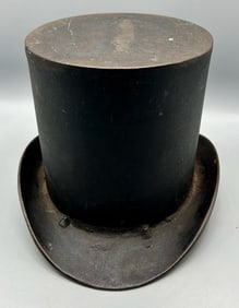 A Cast Iron Top Hat Planter or Spittoon