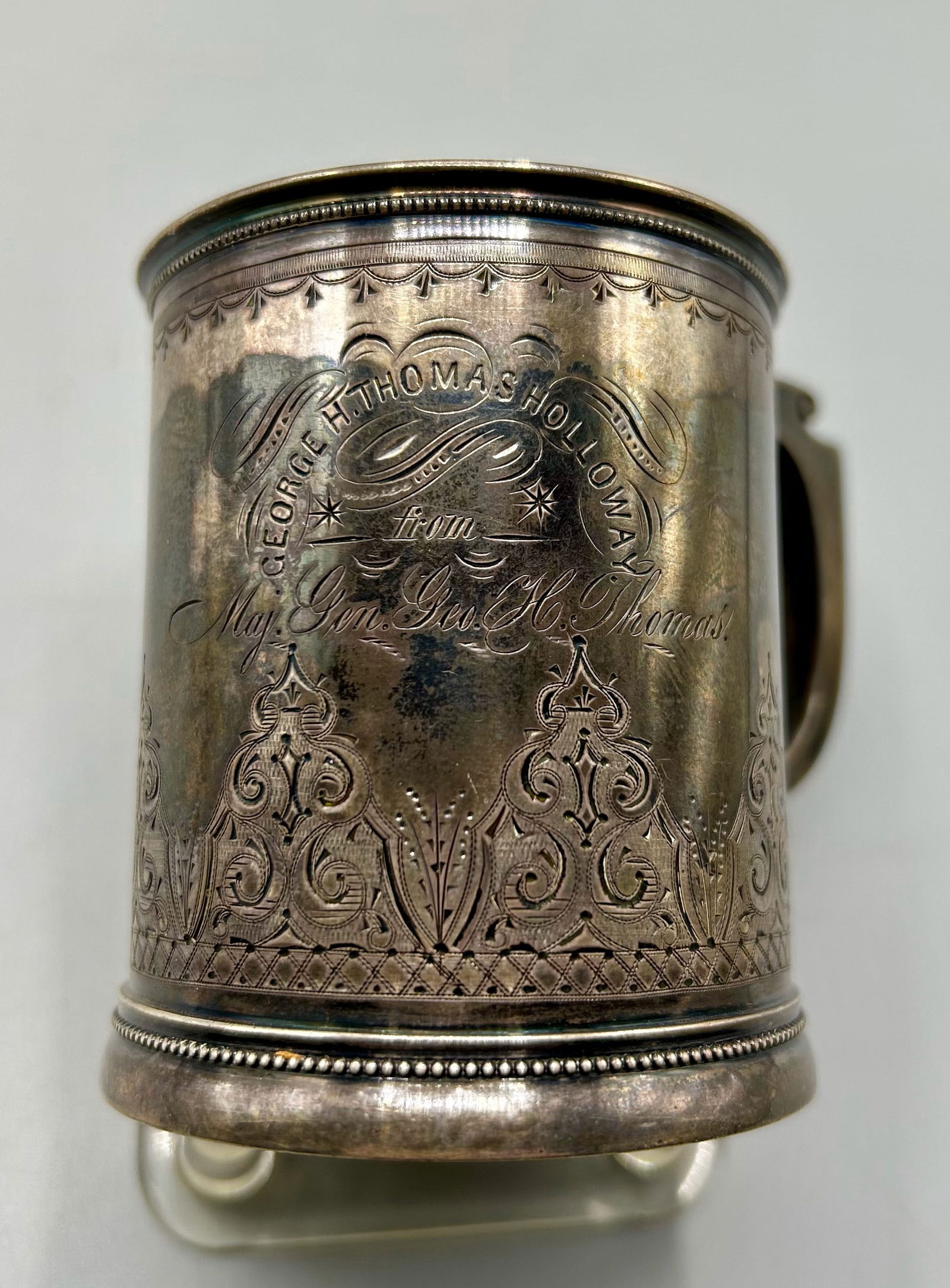 A Small Presentation Sterling Silver Tankard: A 2 7/8 inch high small tankard with a hand engraved inscription and presented to "George H. Thomas Holloway from Major Gen. Geo. H. Thomas." General George Henry Thomas(1816-1870), was a Union Civil