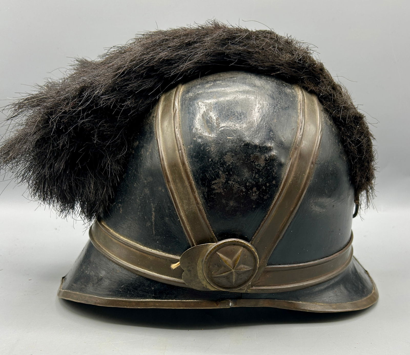 Early Brass & Metal Military Helmet with Bear skin: 10-1/4' by 7' by 7' Metal Military Helmet with Brass decoration and bear skin. Condition as found, missing liner.