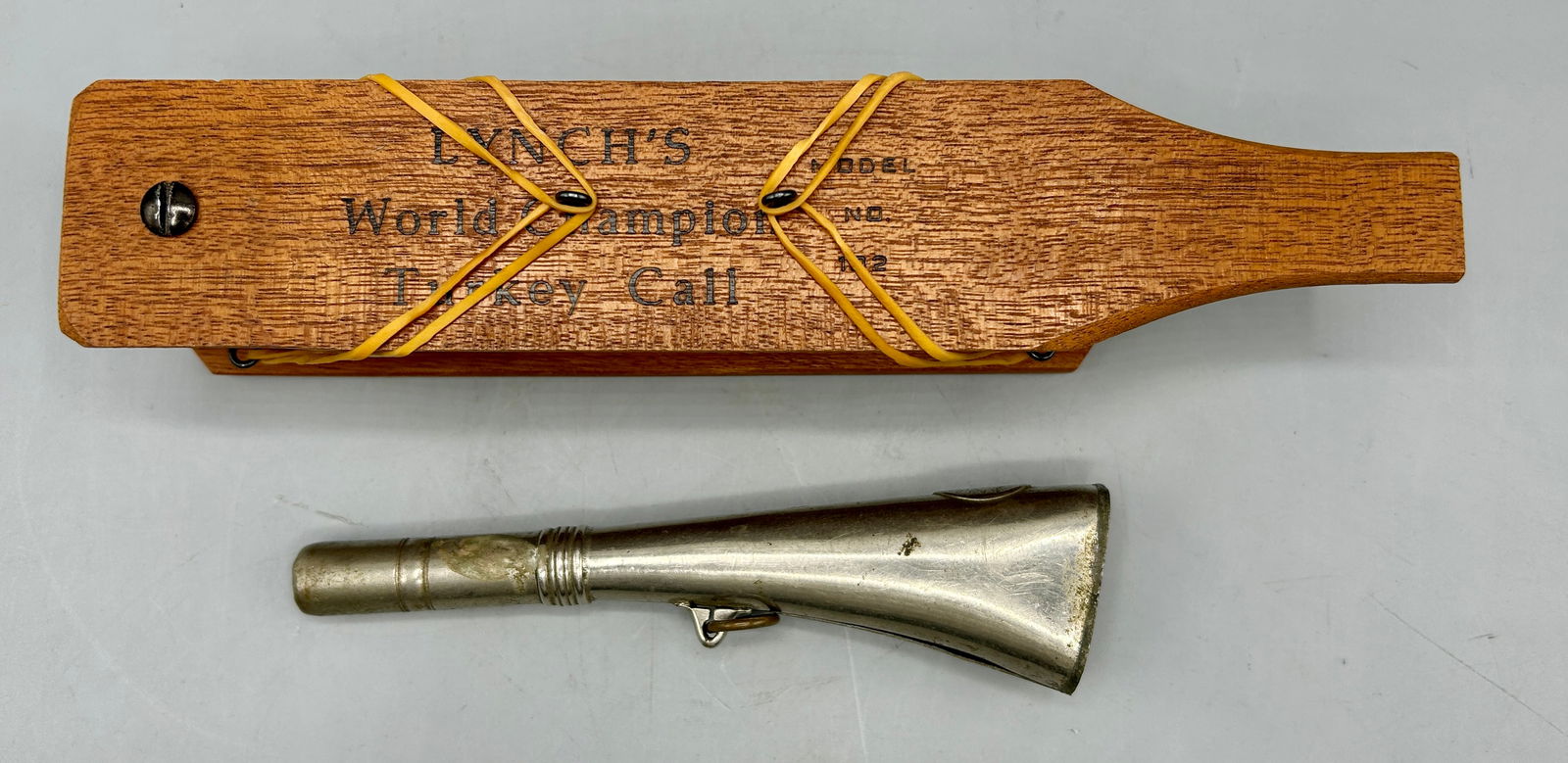 A Fox Hound Horn and a Turkey Call by Lynch (1 of 3)