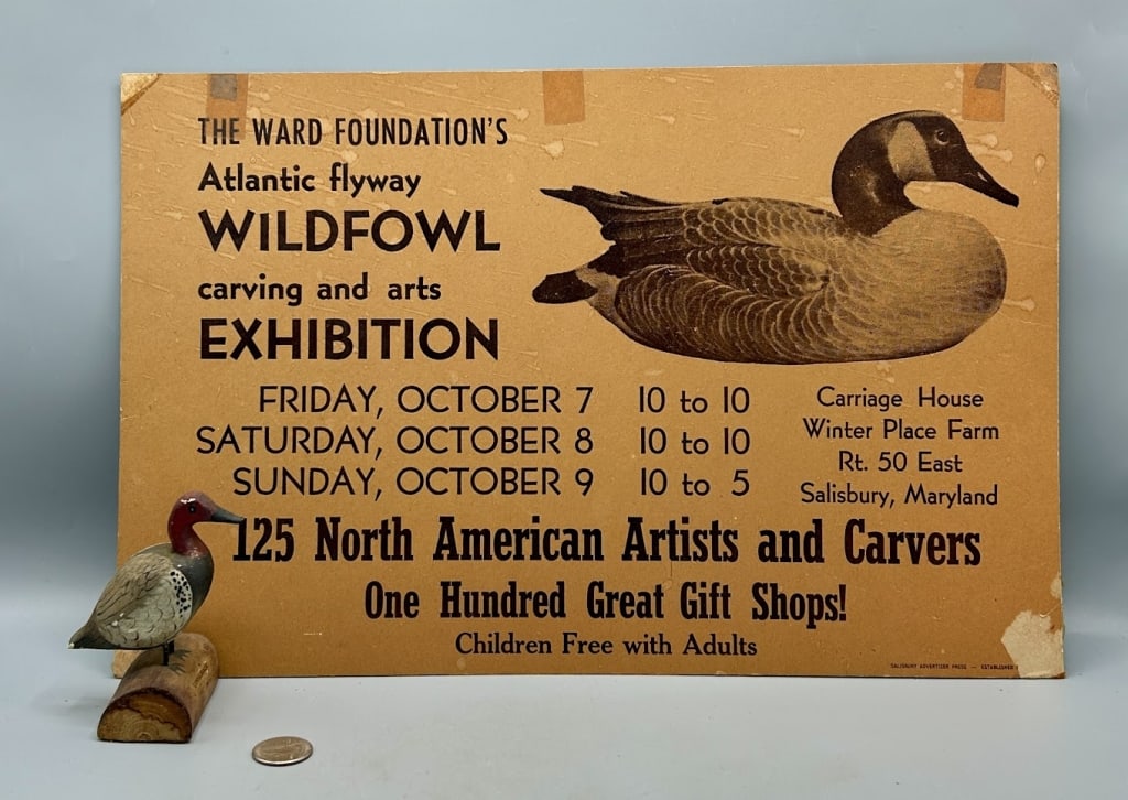 Early Ward Foundation Sign and a Miniature Duck: An early 11 by 17 inch Ward Foundation Show cardboard sign from when the event was held at Winter Place Park in Salibury, MD and a 3 1/2 inch miniature Canvasback carving, As found