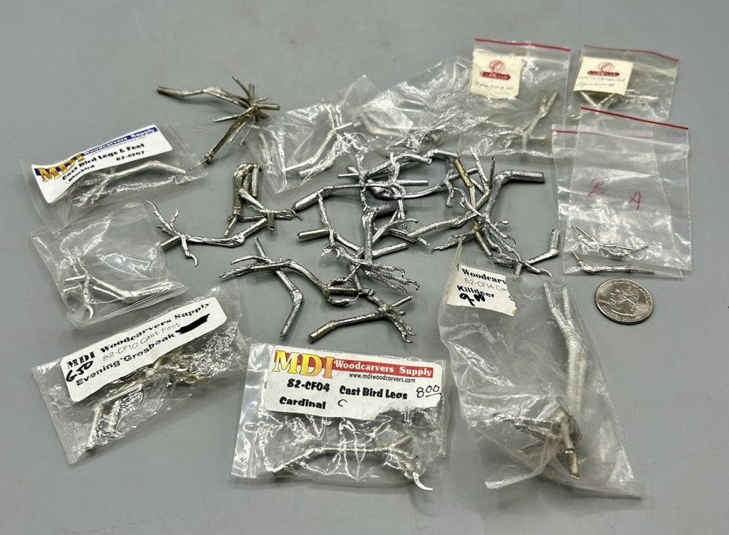 Twenty Four + Pairs of Cast Metal Legs and Feet: Twenty four+ pairs of snstomically correct cast metal bird's legs and feet. As found - almost all of them are like new.