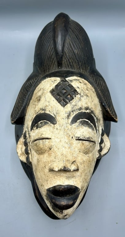 A Carved Wooden Mask from the Punu Tribe of Gabon (1 of 3)