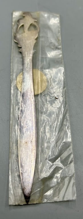 Norwegian Sterling Silver and Enamel Letter Opener: A 6 inch sterling silver letter opener with an enamel floral motif by the Th. Michelsen Co, (1841-1985), Sweden. During WWII the Michelsen Company set up in neutral Sweden and production continued aft