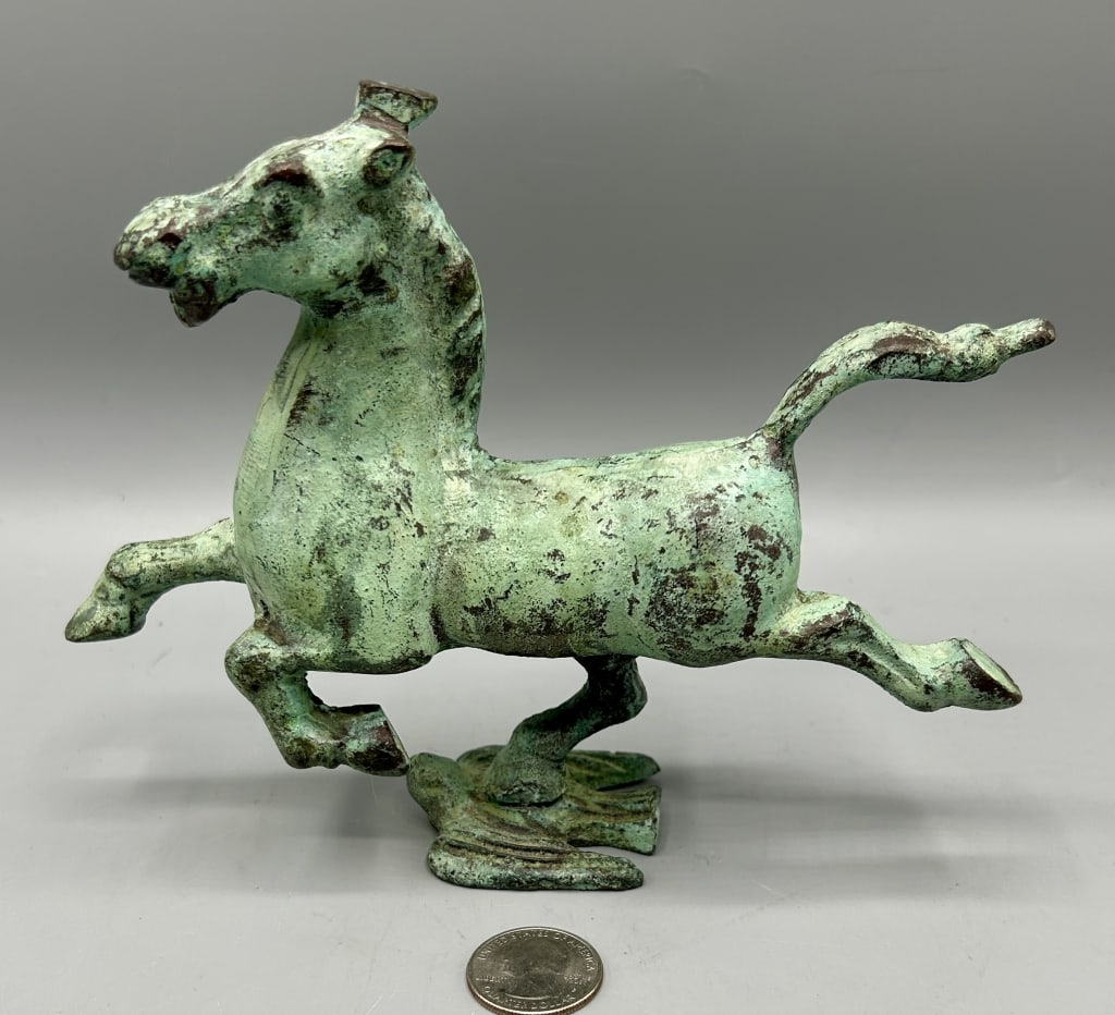 Bronze Horse Sculpture from China: A 5 1/2 by 7 inch later hollow casting of an early 3rd Century Han Dynasty "Flying Horse of Gansu". In as found condition.