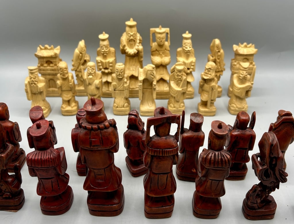 Carved Wooden Oriental Chess Pieces: In good condition.
