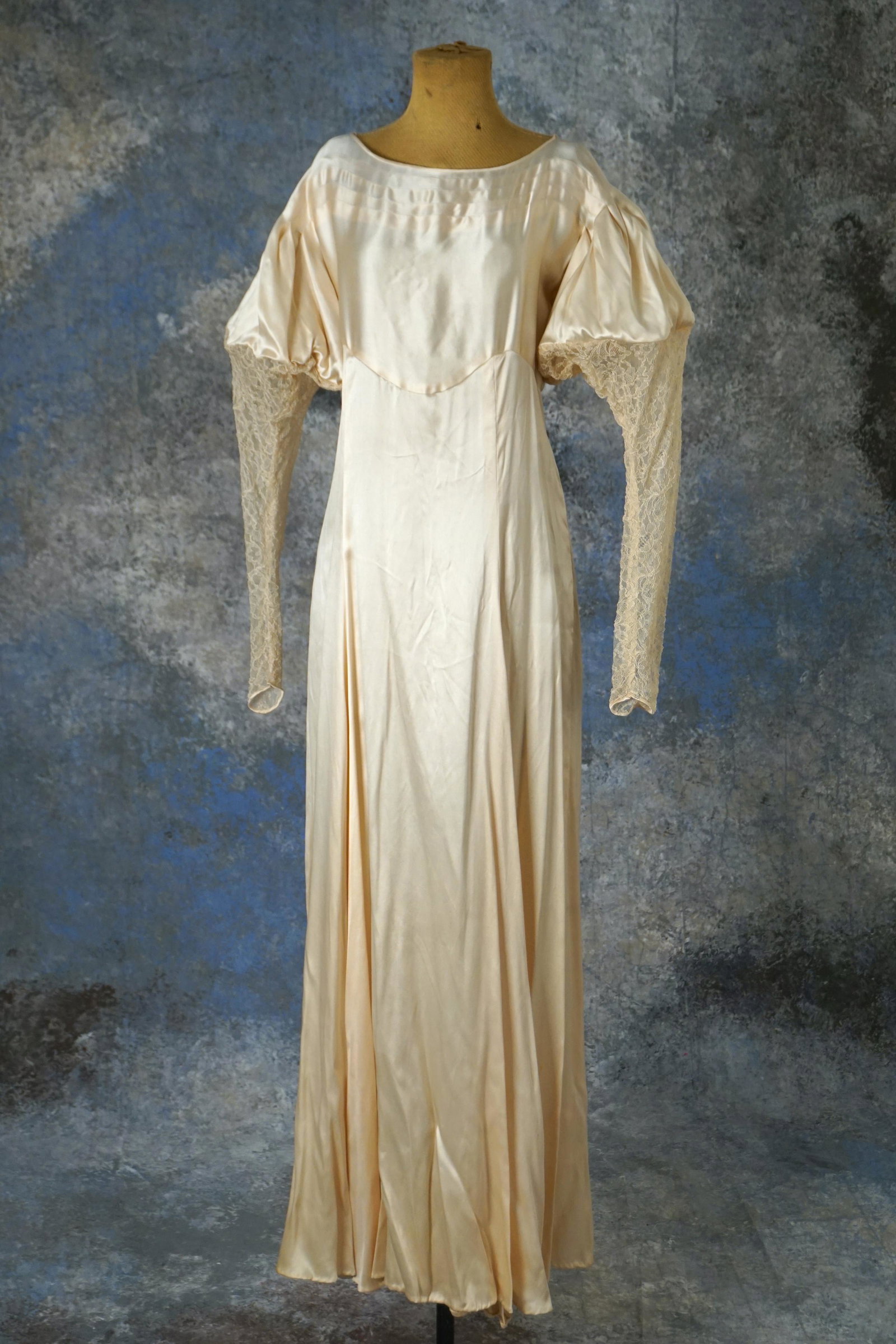 1930s Art Deco wedding gown lace sleeves: Vintage 1930s Art Deco wedding gown ivory silk satin with long sleeve lace Juliet puff sleeves. Unbuttons at the back and small snap buttons on the side. Measures 30” bust, 26” waist, 53&r