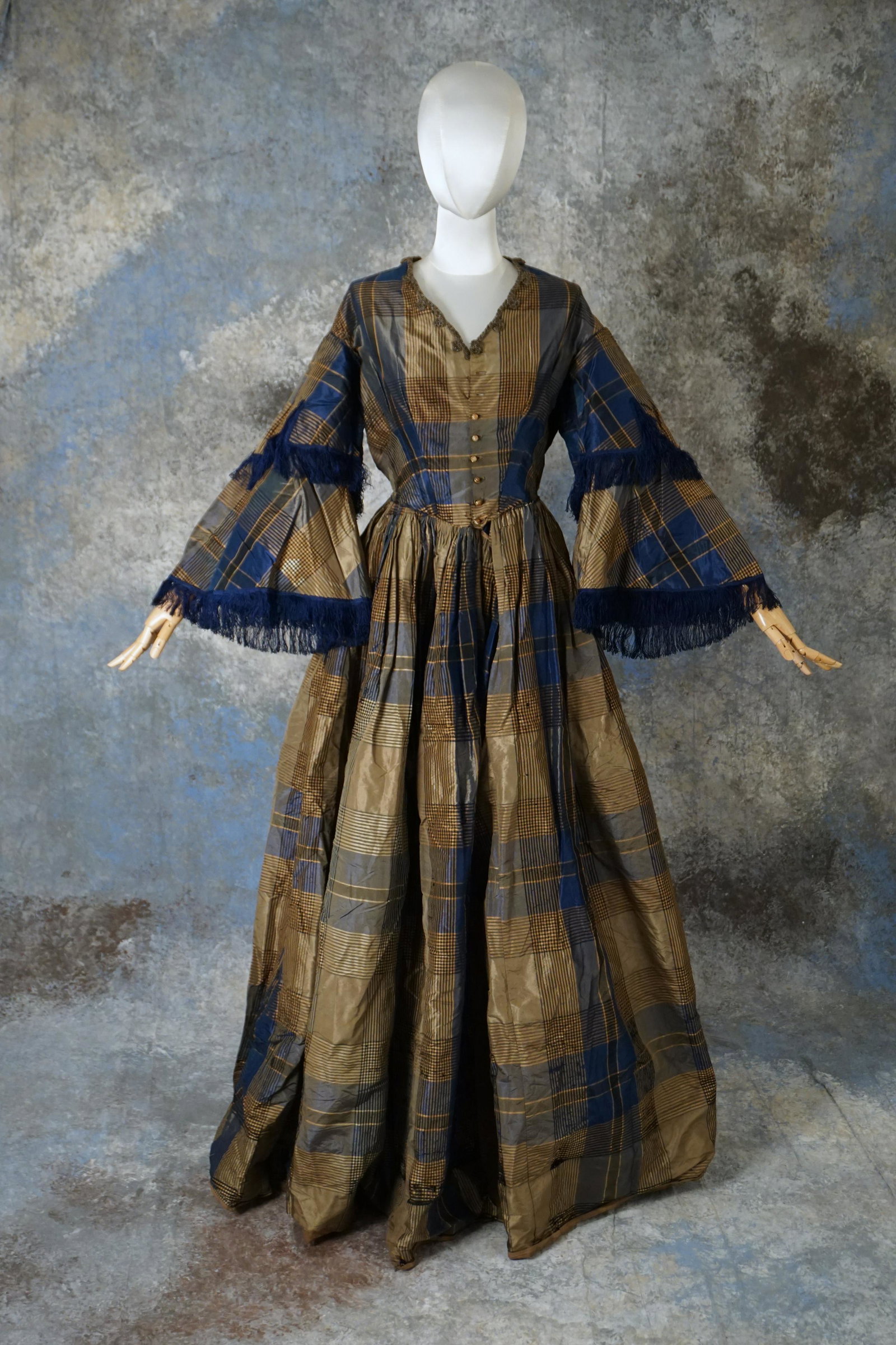 Antique 1860s silk plaid taffeta dress, civil war: Antique Civil War era 1860s blue and brown silk plaid taffeta dress with blue fringe trim and fancy buttons. Measures 28" bust, 12" waist, 55" length. Poor, for study or restoration. Tears, stains, lo