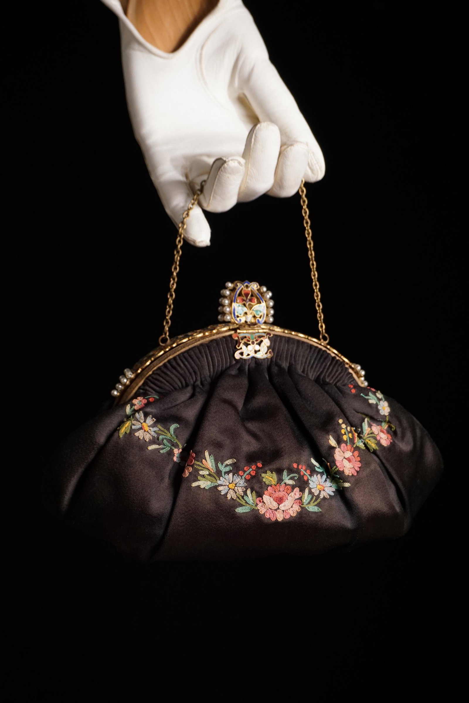 Antique French tambour black satin enameled purse: Vintage 1920s - 30s black satin purse with pink floral tambour embroidery work, beautifully detailed enamel work frame with small pearls. Yellow satin interior with small pocket. Condition: very good 