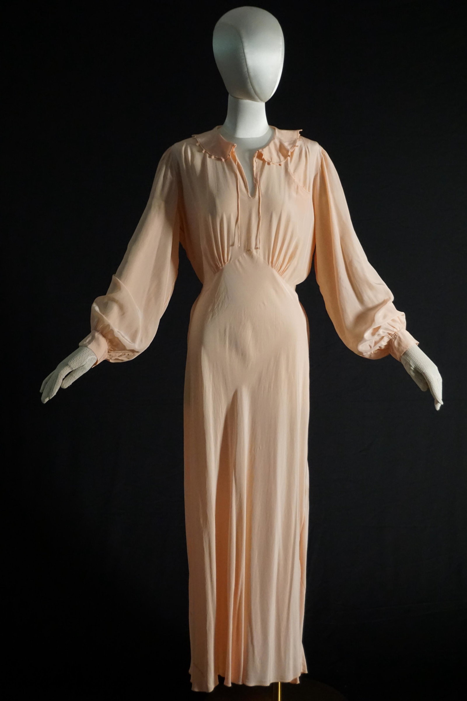 Vintage 1940s Yolande handmade lingerie dress: Vintage 1940s blush pink silk satin rayon long sleeve lingerie dress with mother of pearl buttons. Cute collar, small breast pocket and long ribbon ties. Label: Yolande handmade. Condition: very nicel