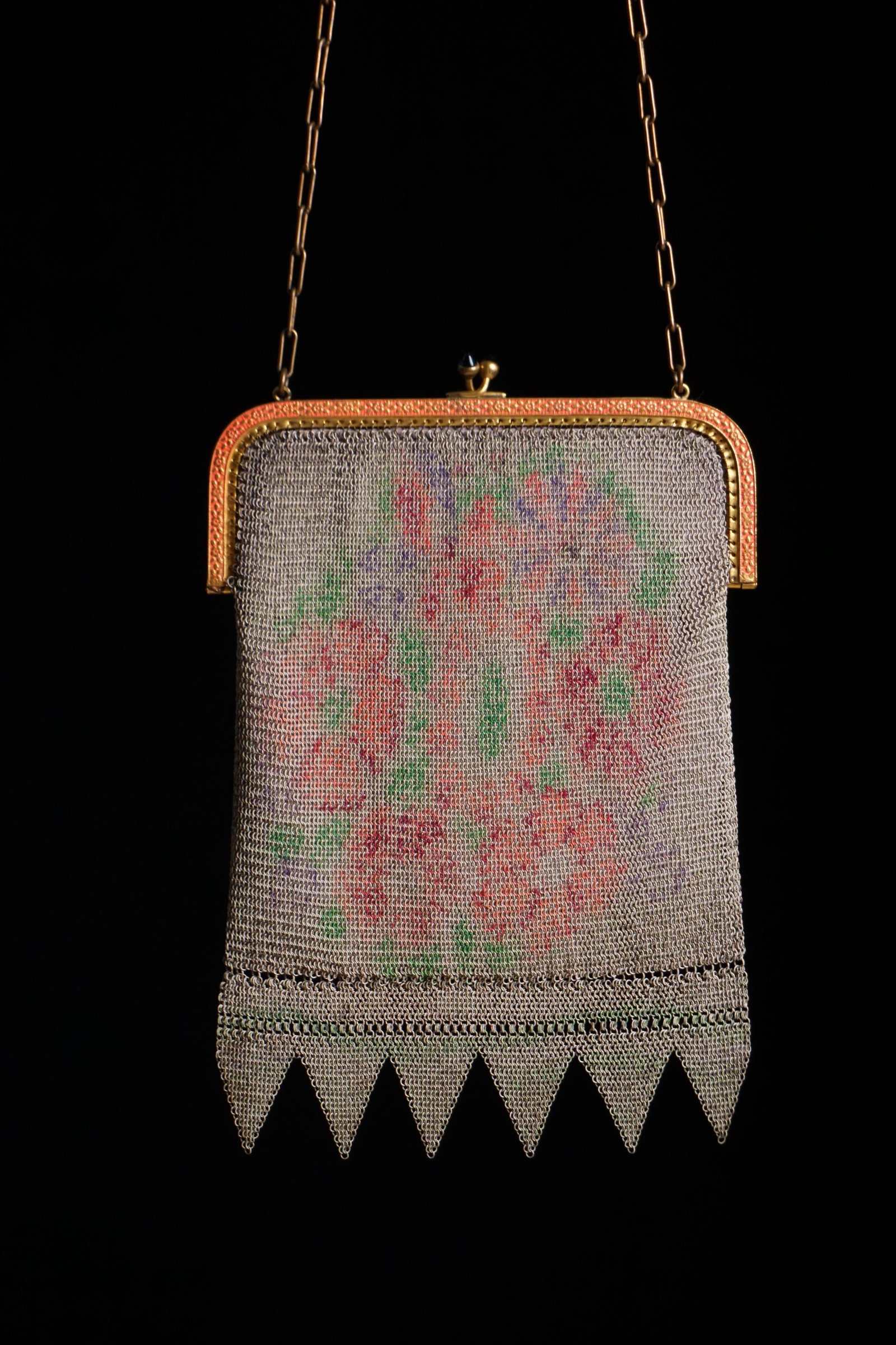Vintage 1920s German Art Deco mesh purse handbag: Antique vintage 1920s hallmarked Germany pink metal mesh watercolor handbag with blue stones at clasp, pink flora enameled frame. Condition: excellent very nicely kept. Purple interior. 7" long x 5" w