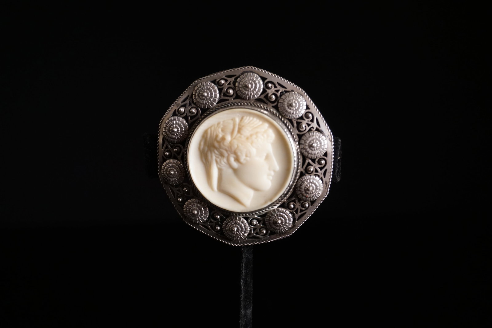 Antique 800 silver filigree carved neoclassical brooch: Likely northern European, well carved and detailed centerpiece portrait of a roman man. Reminiscent of the work of scandinavian silversmiths. Marked 800.2.5" diameter