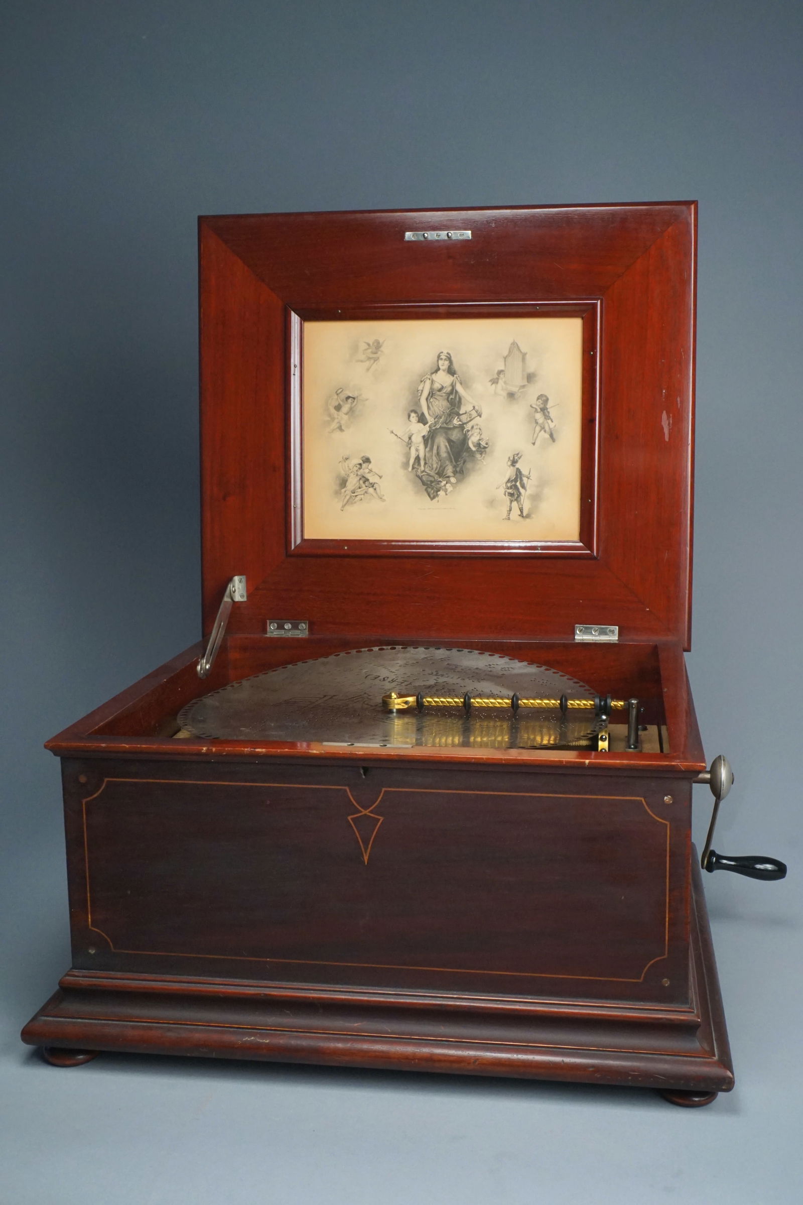 Antique Regina Music player with catalog of discs in custom cabinet (1 of 18)