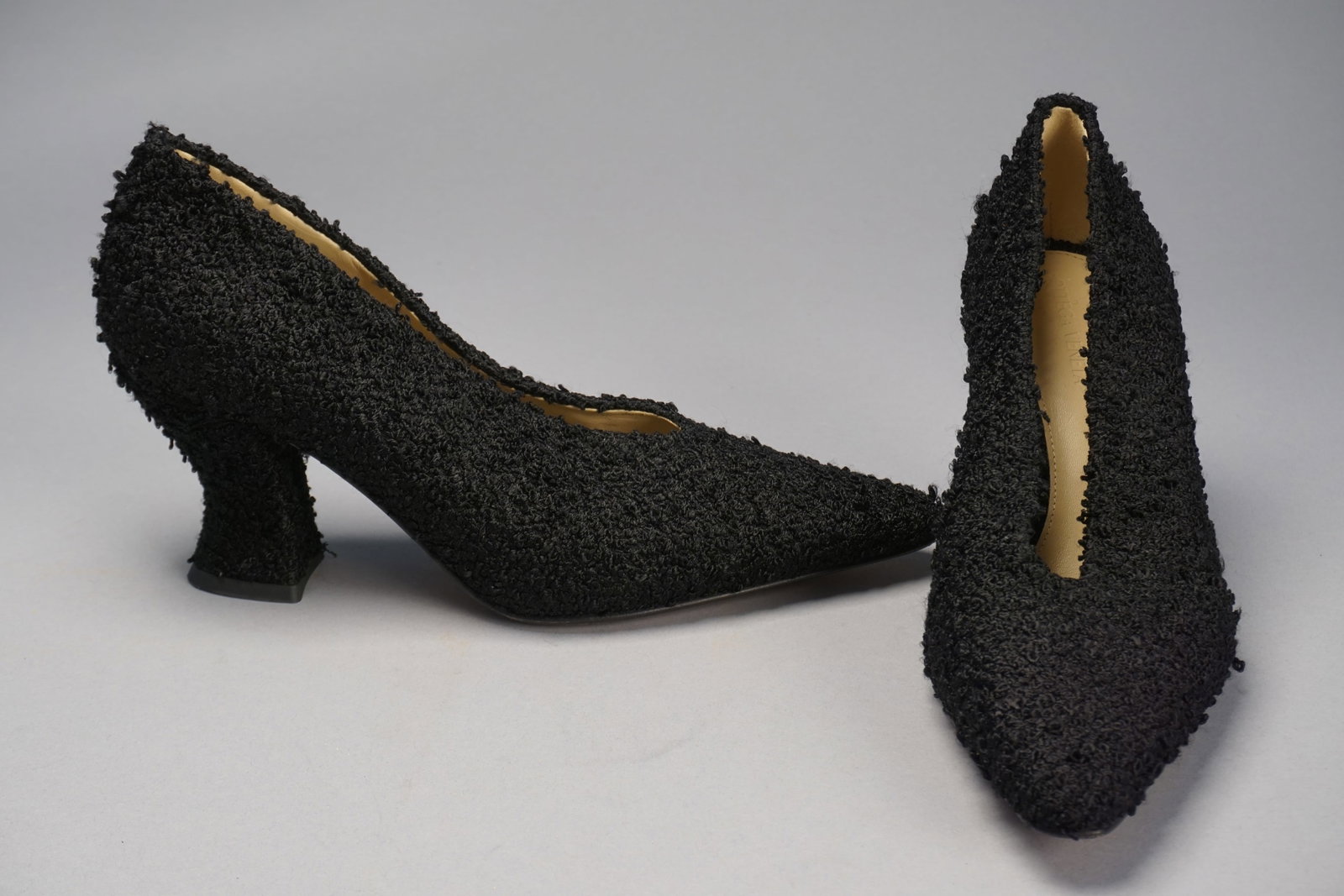 BOTTEGA VENETA Italy curly faux lamb black heels, size 40: BOTTEGA VENETA Italy curly black heels. Marked size 40 but run small, fit more like a US 8 to 8 1/2. Surrealist style heel.