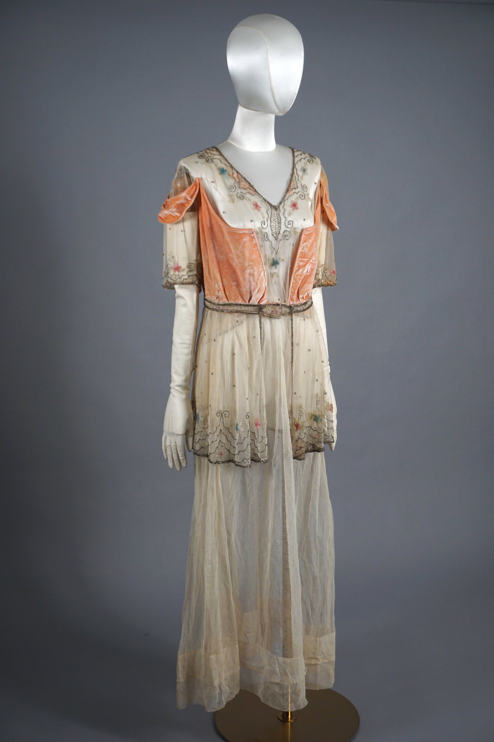 Antique 1910s Titanic era Embroidered Net Lace Pink Velvet Dress: Antique couture custom made 1900-1910s Edwardian era dress with hand embroidered pastel glass beads on fine net lace with pink silk velvet straps and bodice. Measures: 26" waist, 32" bust.