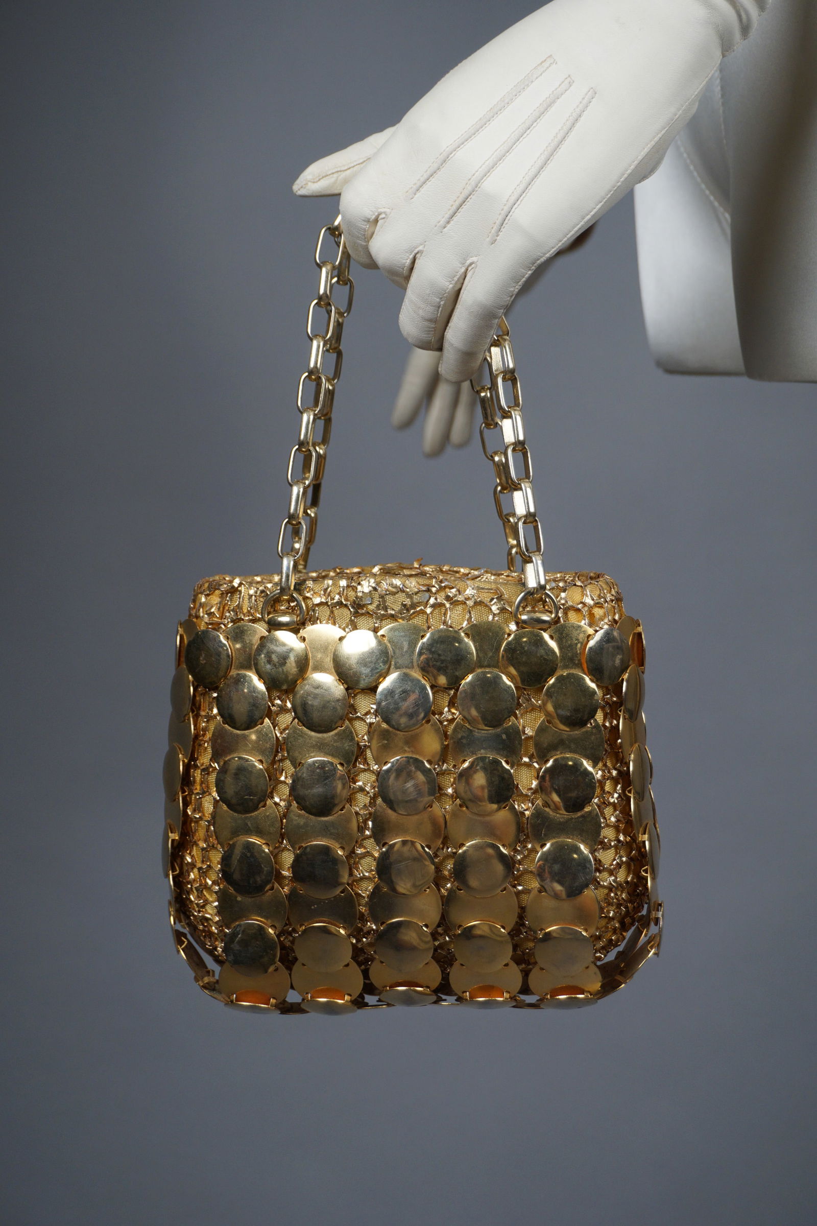 Vintage 1970s Gold Metal Disc Purse Manner Paco Rabanne: Vintage 1960s-70s gold metal disc purse raffia handbag. Measures: 7" x 6", 11" total length while holding chain. Unbranded.