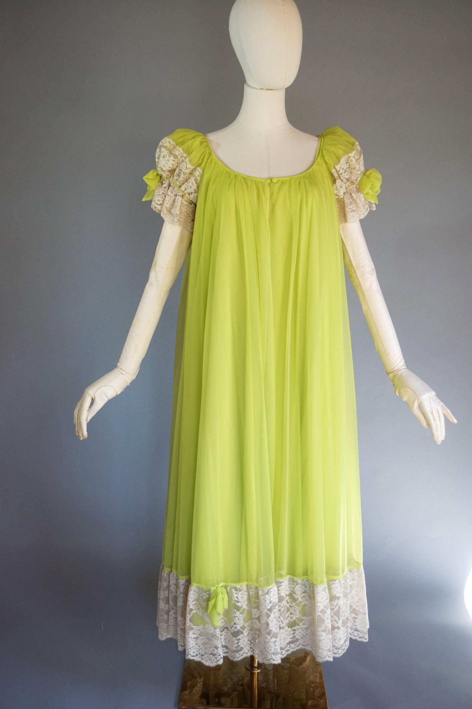 Vintage 1960s Lime Green Claire Sandra by Lucie Ann Beverly Hills Lingerie Dress Set: A stunning vintage 1960s nightgown by Claire Sandra Lucie Ann of Beverly Hills with label, in a rare flowing lime green hue. One slip dress with lace and matching peignoir with voluminous lace puff sl