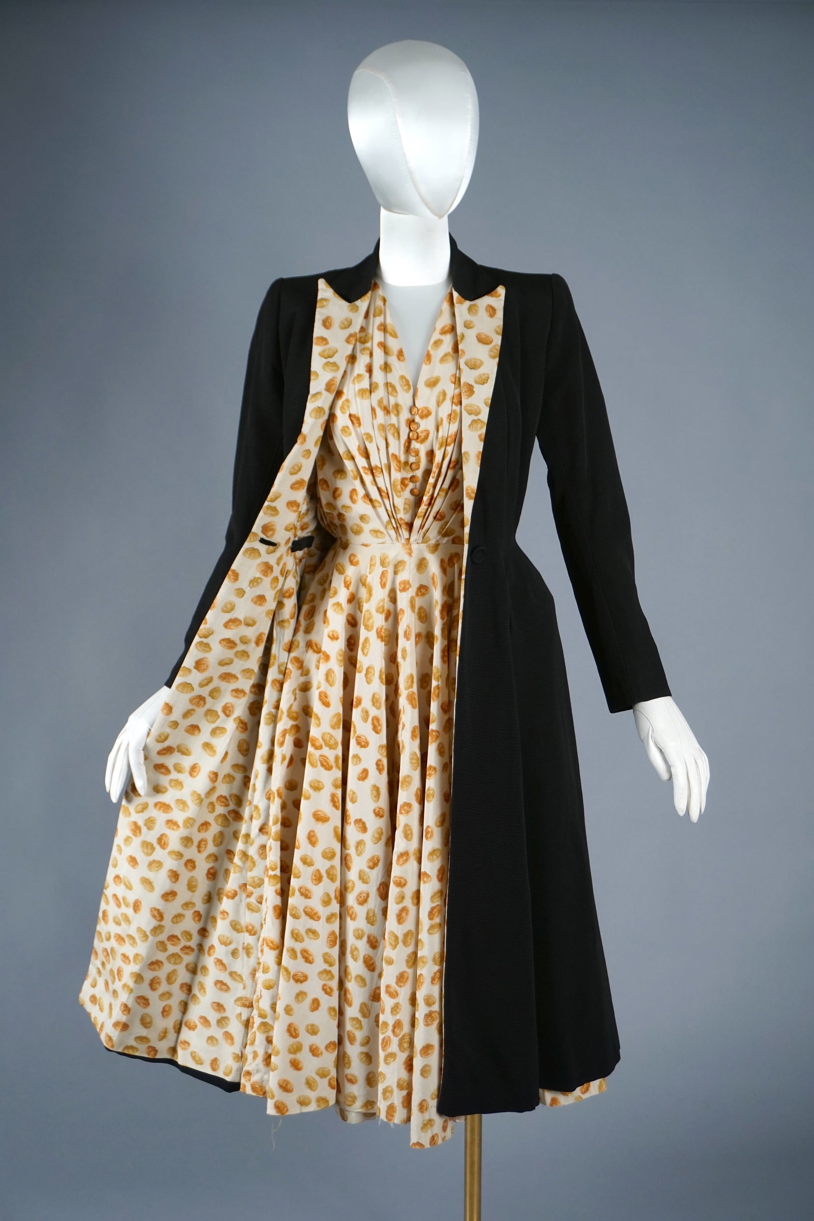 Rare Vintage 1940s 50s Clam Shell Print Dress & Pannier Jacket Set, Ubaldo Chicago Label: A late 1940s- early 50s gem—this rare two-piece set features a crisp tailored jacket that opens to reveal a whimsical surprise: a shell-motif print day dress in cream with warm brown tones. The dres