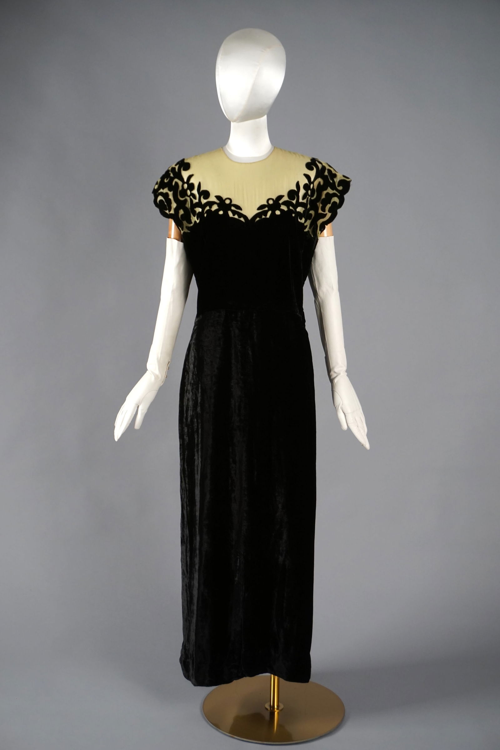 1930s Silk Velvet Dress Sheer Chartreuse Bodice Appliquéd in Velvet: Vintage 1930s- early 1940s evening gown in black silk velvet, dramatically offset by a sheer chartreuse upper bodice rendered in a net or organza. The yoke is richly appliquéd in scrolling black velv