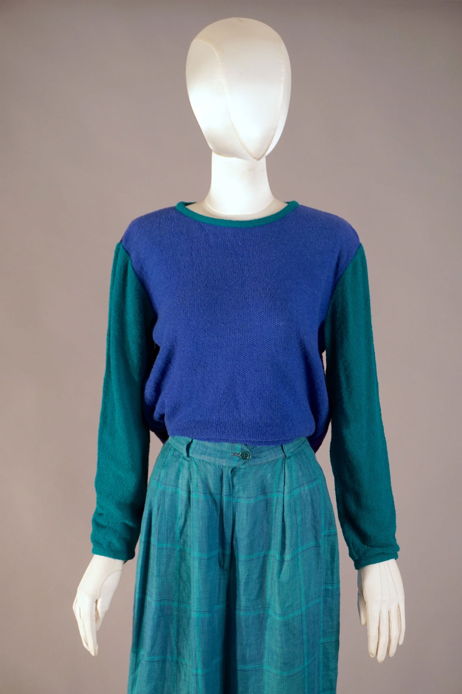 Vintage Missoni Colorblock Bouclé Knit Sweater and Pants, Made in Italy: Lot of two Missoni pieces- vintage crewneck sweater features a textured bouclé knit in bold colorblocking: cobalt blue body, teal sleeves, and deep violet panels at the sides and back. Trimmed in con
