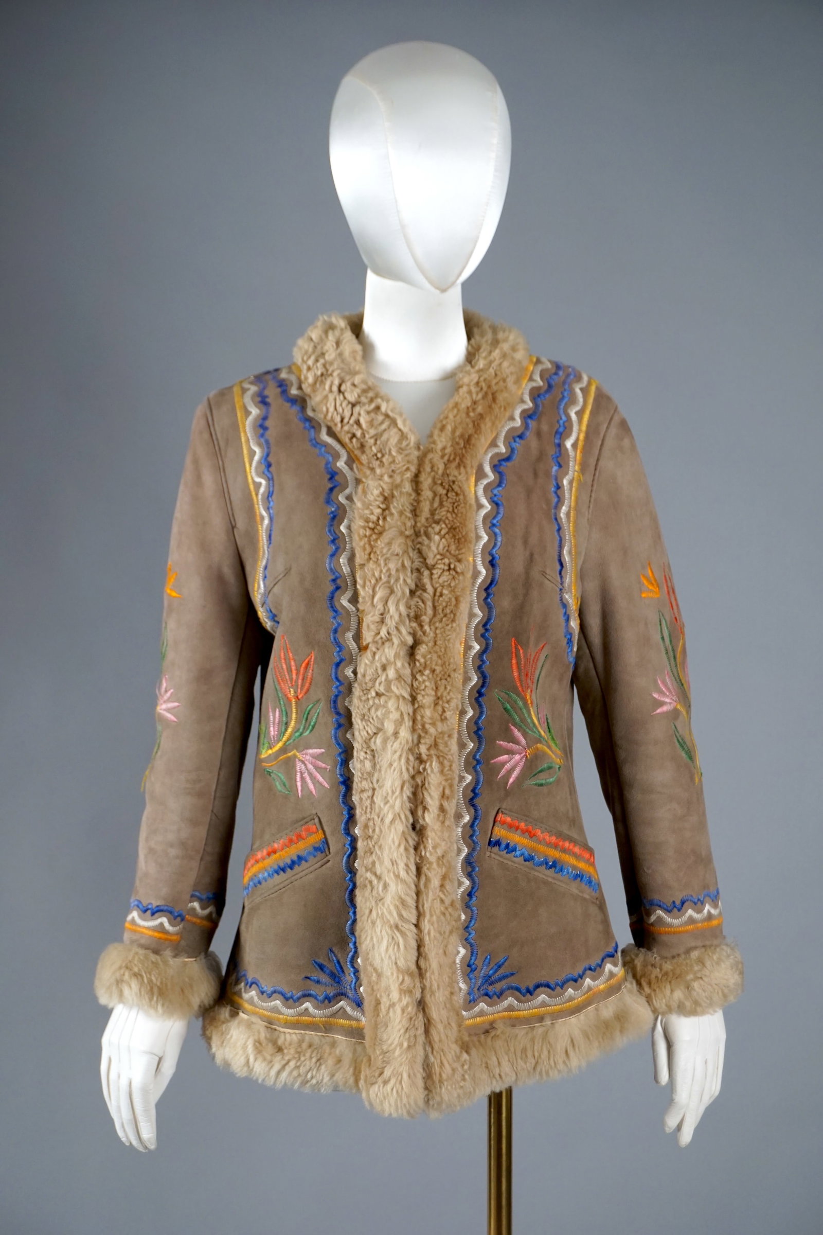 1970s Embroidered Penny Lane Afghan Suede & Shearling Coat, Woodstock Era Bohemian: A vintage 1970s Penny Lane/ Afghan coat, beautifully hand-embroidered in vivid threadwork against soft taupe suede. It features a full genuine shearling lining, visible at the cuffs, collar, and hem f