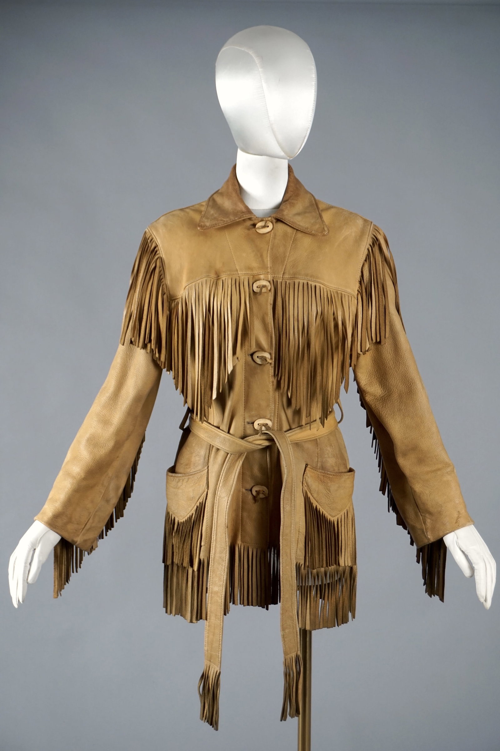 Vintage 1940s–50s Handmade Fringe Leather Western Jacket: Exceptional mid-century handmade leather fringe jacket, likely dating to the 1940s or 1950s. Crafted in soft caramel-toned leather with dramatic fringe detailing across the chest, sleeves, hem, and be