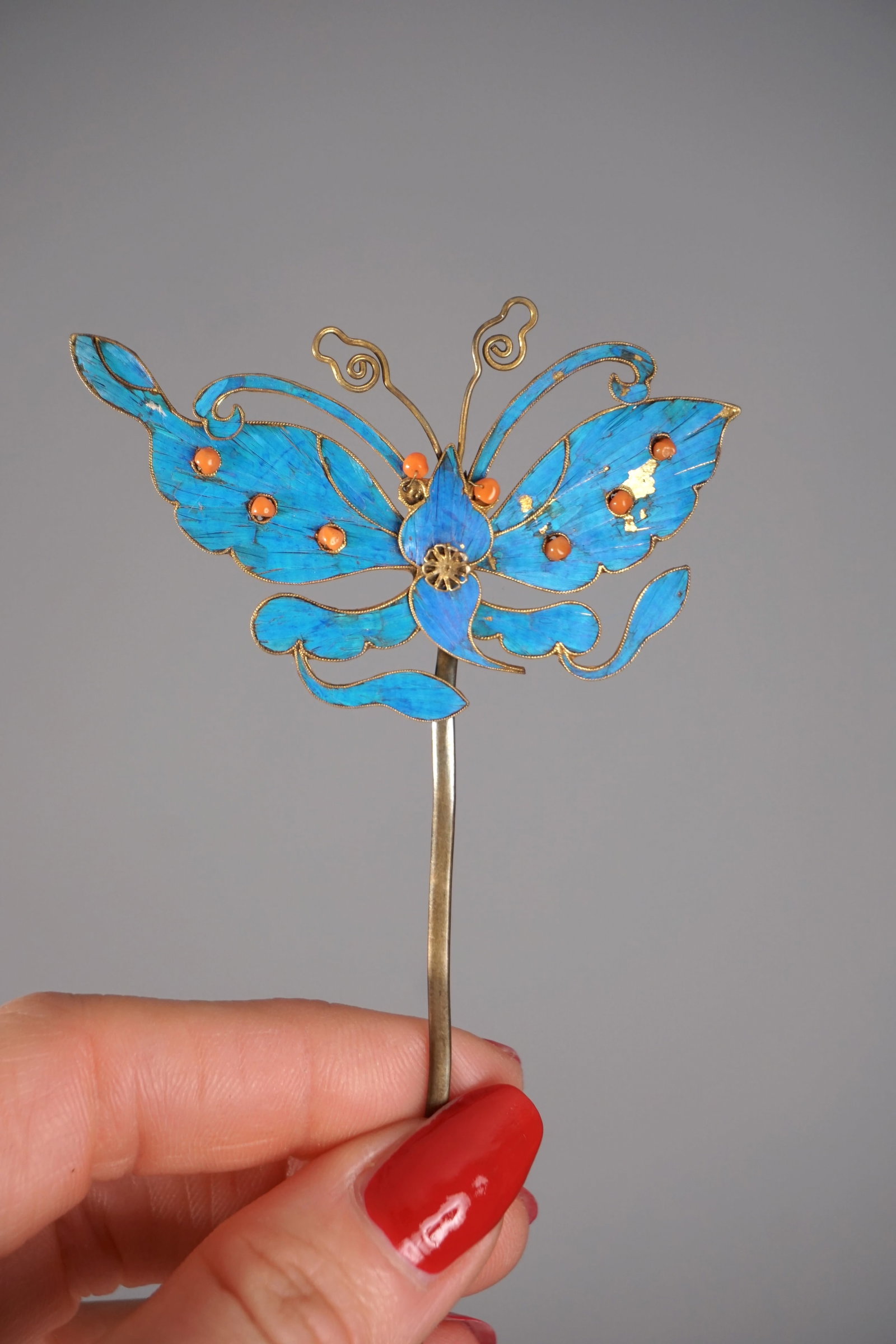 Chinese Kingfisher Butterfly Hairpin, Orange Beads (1): Antique 19th century Chinese Kingfisher feather butterfly hairpin ornament with small orange beads. Measurements: 2.75” wide x 1.75” tall x 6” total length.